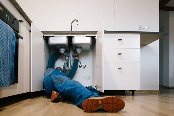 Professional Emergency Plumber technician working in Greens Fork, IN